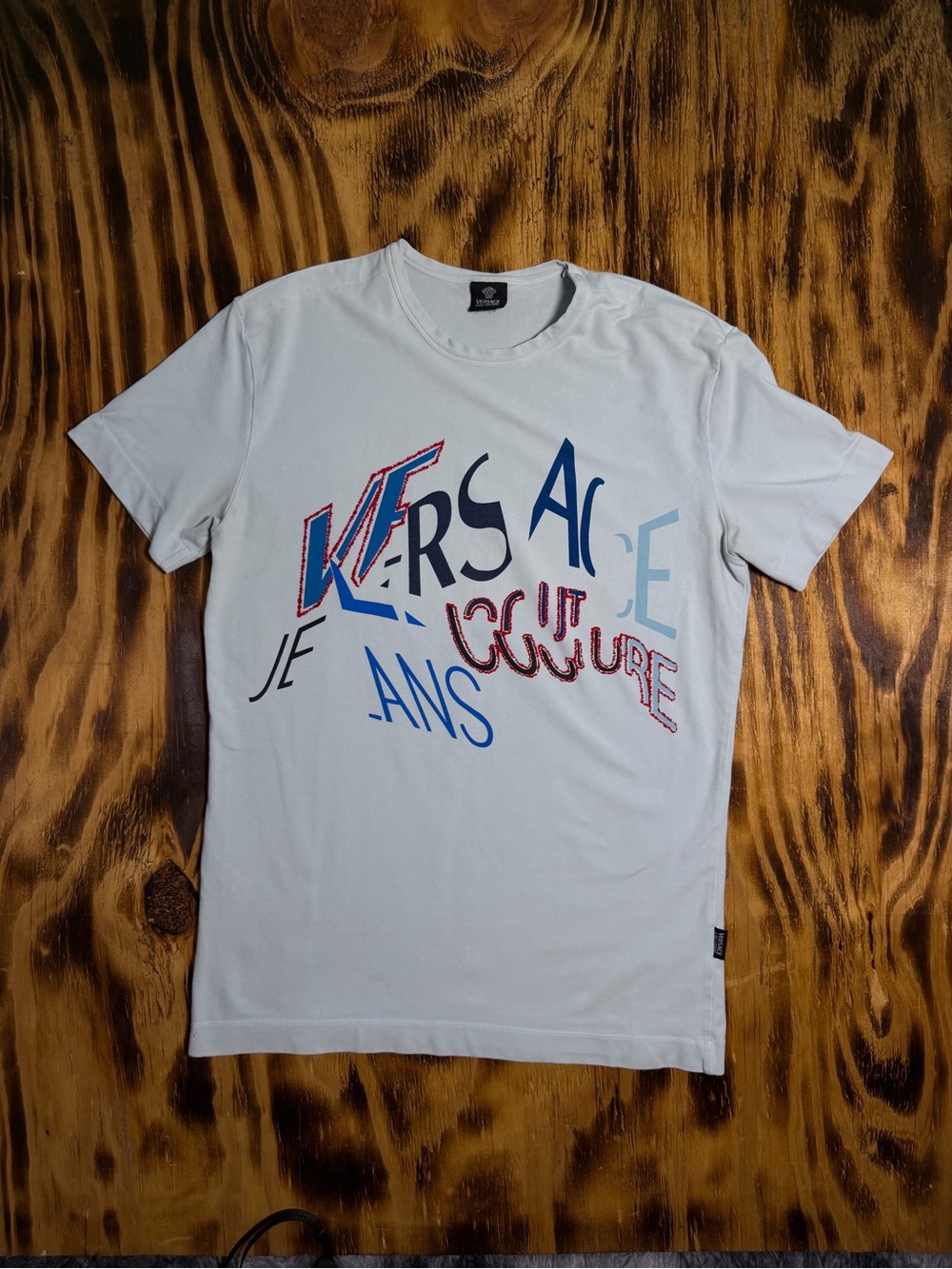 Versace light blue Short Sleeve Graphic Logo Tee with Blue and Red Accents